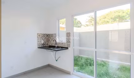 Casa em condomínio fechado com 2 quartos à venda na Rua Miguel Ascoleze, 125, Vila Nova, Porto Alegre, 60 m2 por R$ 319.000