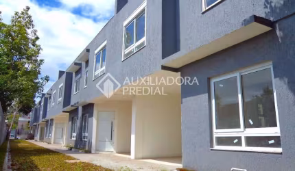 Casa em condomínio fechado com 3 quartos à venda na Rua Doutor Mário Totta, 2430, Tristeza, Porto Alegre, 114 m2 por R$ 580.000