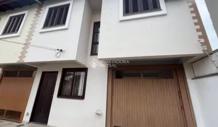 Casa em condomínio fechado com 3 quartos à venda na Rua Adão da Silva Santos, 230, São José, Canoas, 112 m2 por R$ 500.000