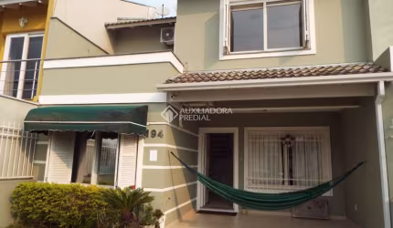 Casa em condomínio fechado com 3 quartos à venda na Rua Eroni Soares Machado, 194, Hípica, Porto Alegre, 124 m2 por R$ 650.000