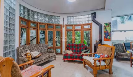 Casa em condomínio fechado com 6 quartos à venda na Rua Carlos Ferreira, 130, Teresópolis, Porto Alegre, 496 m2 por R$ 850.000