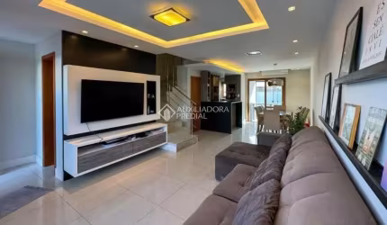Casa com 3 quartos à venda na Rua Pau Brasil, 659, Hípica, Porto Alegre, 133 m2 por R$ 600.000