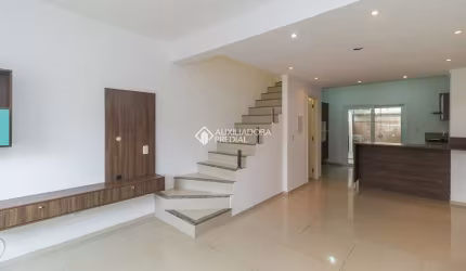 Casa com 2 quartos à venda na Rua Doutor Cláudio Walter Ferreira da Silva, 74, Guarujá, Porto Alegre, 137 m2 por R$ 410.000