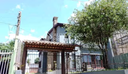 Casa em condomínio fechado com 5 quartos à venda na Rua Carajá, 213, Vila Assunção, Porto Alegre, 525 m2 por R$ 1.700.000