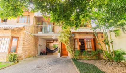 Casa em condomínio fechado com 3 quartos à venda na Avenida Flamengo, 515, Ipanema, Porto Alegre, 268 m2 por R$ 895.000