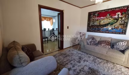 Casa com 3 quartos à venda na Rua Aleste Luiz Belocchio, 122, Teresópolis, Porto Alegre, 232 m2 por R$ 499.000