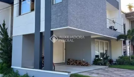 Casa em condomínio fechado com 3 quartos à venda na Rua Ivo Walter Kern, 599, Hípica, Porto Alegre, 260 m2 por R$ 1.200.000