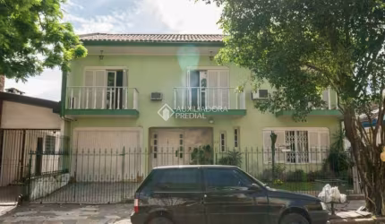 Casa em condomínio fechado com 3 quartos à venda na Rua Investigador Pedro Loeci Martins, 40, Nonoai, Porto Alegre, 271 m2 por R$ 690.000