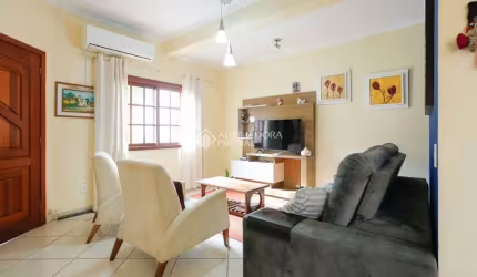 Casa com 3 quartos à venda na Avenida José Corrêa da Silva, 337, Cavalhada, Porto Alegre, 126 m2 por R$ 650.000