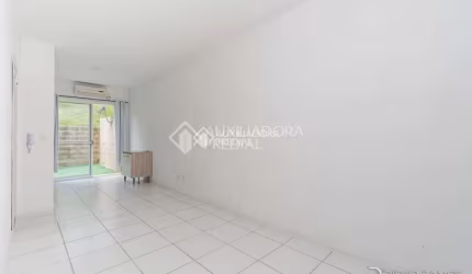Casa em condomínio fechado com 2 quartos à venda na Estrada Caminho do Meio, 5701, Stella Maris, Alvorada, 51 m2 por R$ 210.000