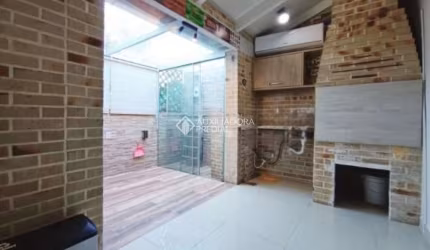 Casa em condomínio fechado com 2 quartos à venda na Avenida José Aloísio Filho, 889, Humaitá, Porto Alegre, 90 m2 por R$ 383.000