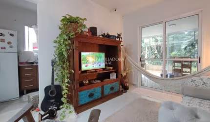 Casa em condomínio fechado com 3 quartos à venda na Estrada Caminho do Meio, 5425, Stella Maris, Alvorada, 65 m2 por R$ 298.000