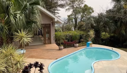 Casa com 5 quartos à venda na Rua dos Guaranis, 390, Espírito Santo, Porto Alegre, 218 m2 por R$ 1.050.000