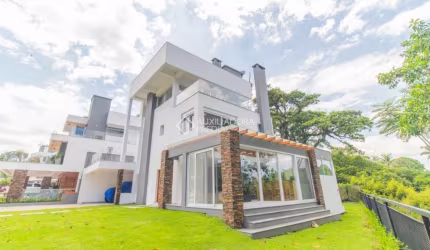 Casa em condomínio fechado com 3 quartos para alugar na Avenida Coronel Marcos, 1239, Pedra Redonda, Porto Alegre, 335 m2 por R$ 29.900