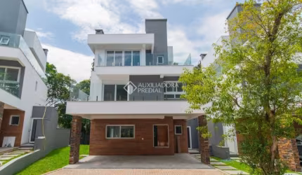 Casa em condomínio fechado com 3 quartos para alugar na Avenida Coronel Marcos, 1239, Pedra Redonda, Porto Alegre, 300 m2 por R$ 18.000