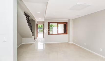 Casa com 3 quartos para alugar na Rua Ronaldo Molina de Quadros, 410, Mário Quintana, Porto Alegre, 102 m2 por R$ 4.000