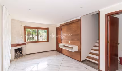 Casa em condomínio fechado com 3 quartos para alugar na Rua Doutor Lauro Miguel Sturm, 217, Hípica, Porto Alegre, 118 m2 por R$ 3.500