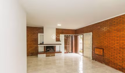 Casa em condomínio fechado com 5 quartos para alugar na Rua Osmar Amaro de Freitas, 193, Jardim Itu Sabará, Porto Alegre, 290 m2 por R$ 4.940