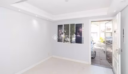 Casa em condomínio fechado com 3 quartos para alugar na Avenida José Aloísio Filho, 801, Humaitá, Porto Alegre, 104 m2 por R$ 2.500
