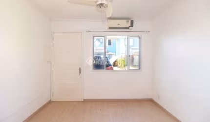 Casa em condomínio fechado com 2 quartos para alugar na Avenida José Aloísio Filho, 889, Humaitá, Porto Alegre, 88 m2 por R$ 1.600