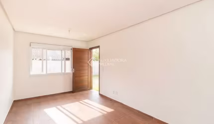 Casa em condomínio fechado com 2 quartos para alugar na Rua Santa Mônica, 404, Ponta Grossa, Porto Alegre, 60 m2 por R$ 1.200
