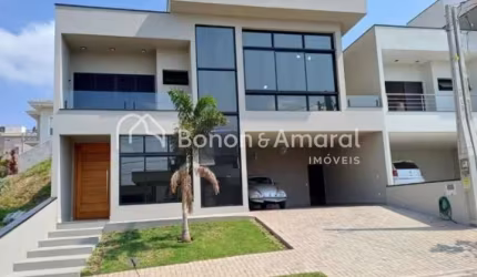 Excelente casa em condomínio por R$ 1.490.000,00, com elevador, 3 suítes e piscina,