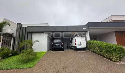 Casa térrea com 3 dormitórios e churrasqueira no Condomínio Village São Carlos IV