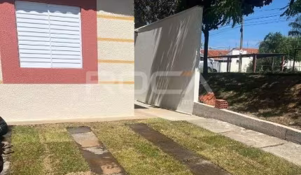 Casa à venda em Condomínio Moradas 2, São Carlos - 2 dormitórios, suíte, cozinha e garagem