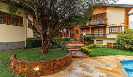 Sobrado estilo suiço, alto padrão, com piscina, 5 suítes, 8 vagas à venda, 540 m² por R$ 4.000.000 - Jardim Bela Vista - Santo André/SP