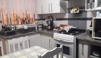 Sobrado com 3 dormitórios à venda, 194 m² por R$ 700.000,00 - Jardim das Maravilhas - Santo André/SP