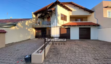 Sobrado para locação com 5 quartos, cozinha com armários, churrasqueira e garagem para 4 carros - 3