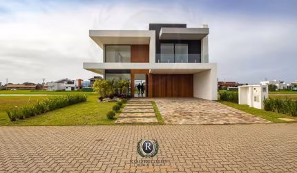 Casa venda Torres RS condomínio fechado beira lago
