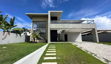 Casa em condomínio com 4 suítes localizado em Barra do Jacuipe, 800m terreno Camaçari - BA