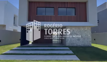 Casa duplex a venda de 4 suítes com área gourmet com piscina e 4 garagens no Alphaville Litoral Norte 2