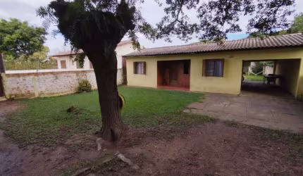 lindo terreno com 2 casas em ótima localização