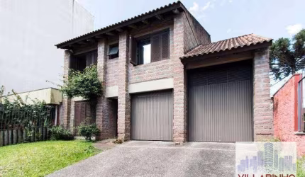 Casa com 4 dormitórios e gabinete à venda, 315 m² por R$ 800.000 - Camaquã - Porto Alegre/RS