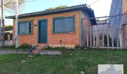 TERRENO COM DUAS CASAS DE 2 DORMITÓRIOS NA VILA NOVA