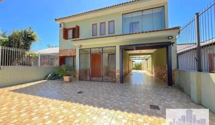 Casa com 6 dormitórios à venda, 344 m² por R$ 1.350.000,00 - Tristeza - Porto Alegre/RS