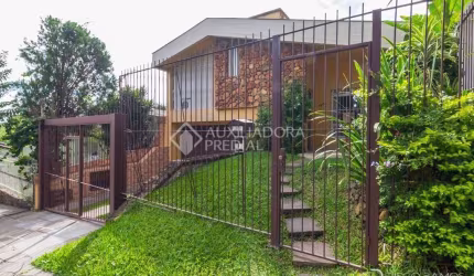Casa em condomínio fechado com 3 quartos à venda na Rua Cláudio Manoel da Costa, 140, Jardim Itu Sabará, Porto Alegre, 262 m2 por R$ 899.000