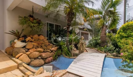 Casa com 5 quartos à venda na Rua Walir Zottis, 505, Jardim Itu Sabará, Porto Alegre, 611 m2 por R$ 2.090.000