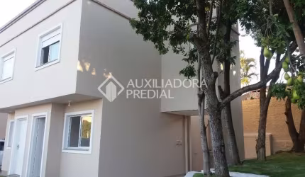 Casa em condomínio fechado com 2 quartos à venda na Rua Cangussu, 329, Nonoai, Porto Alegre, 74 m2 por R$ 370.000