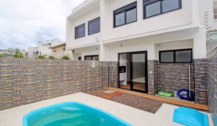 Casa em condomínio fechado com 3 quartos à venda na Rua Lagoa do Peixe, 95, Sarandi, Porto Alegre, 170 m2 por R$ 890.000