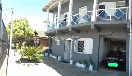 Casa em condomínio fechado com 3 quartos à venda na Avenida Souza Melo, 970, Sarandi, Porto Alegre, 500 m2 por R$ 450.000