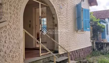 Casa com 4 quartos à venda na Avenida Felipe Weimann, 98, Santa Tereza, Porto Alegre, 180 m2 por R$ 348.000
