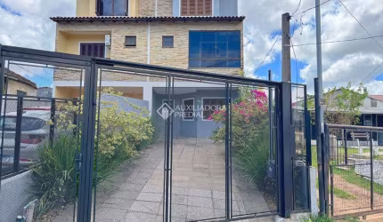 Casa com 3 quartos à venda na Rua dos Carijós, 324, Espírito Santo, Porto Alegre, 187 m2 por R$ 699.000