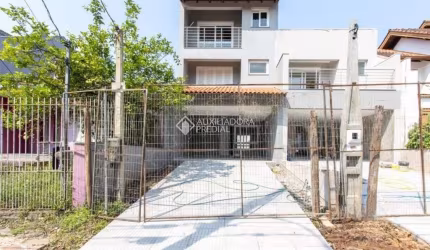 Casa com 2 quartos à venda na Rua Ari Peixoto Martins, 154, Espírito Santo, Porto Alegre, 140 m2 por R$ 590.000