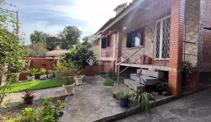 Casa com 4 quartos à venda na Major Tito, 160, Belém Velho, Porto Alegre, 250 m2 por R$ 700.000