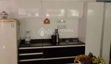 Casa em condomínio fechado com 3 quartos à venda na Rua Erechim, 293, Nonoai, Porto Alegre, 158 m2 por R$ 550.000