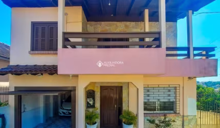 Casa com 4 quartos à venda na Rua Engenheiro Oscar da Cunha Corrêa, 163, Jardim Carvalho, Porto Alegre, 240 m2 por R$ 424.900