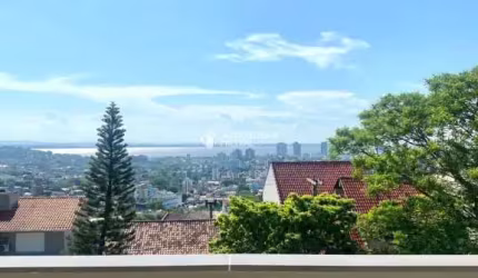 Casa em condomínio fechado com 3 quartos à venda na Rua Alcebíades Antônio dos Santos, 510, Nonoai, Porto Alegre, 214 m2 por R$ 995.000